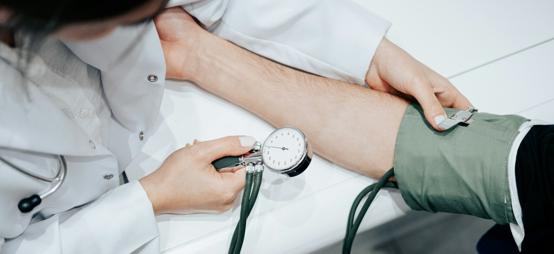 Stock photo of a person getting a blood pressure reading.